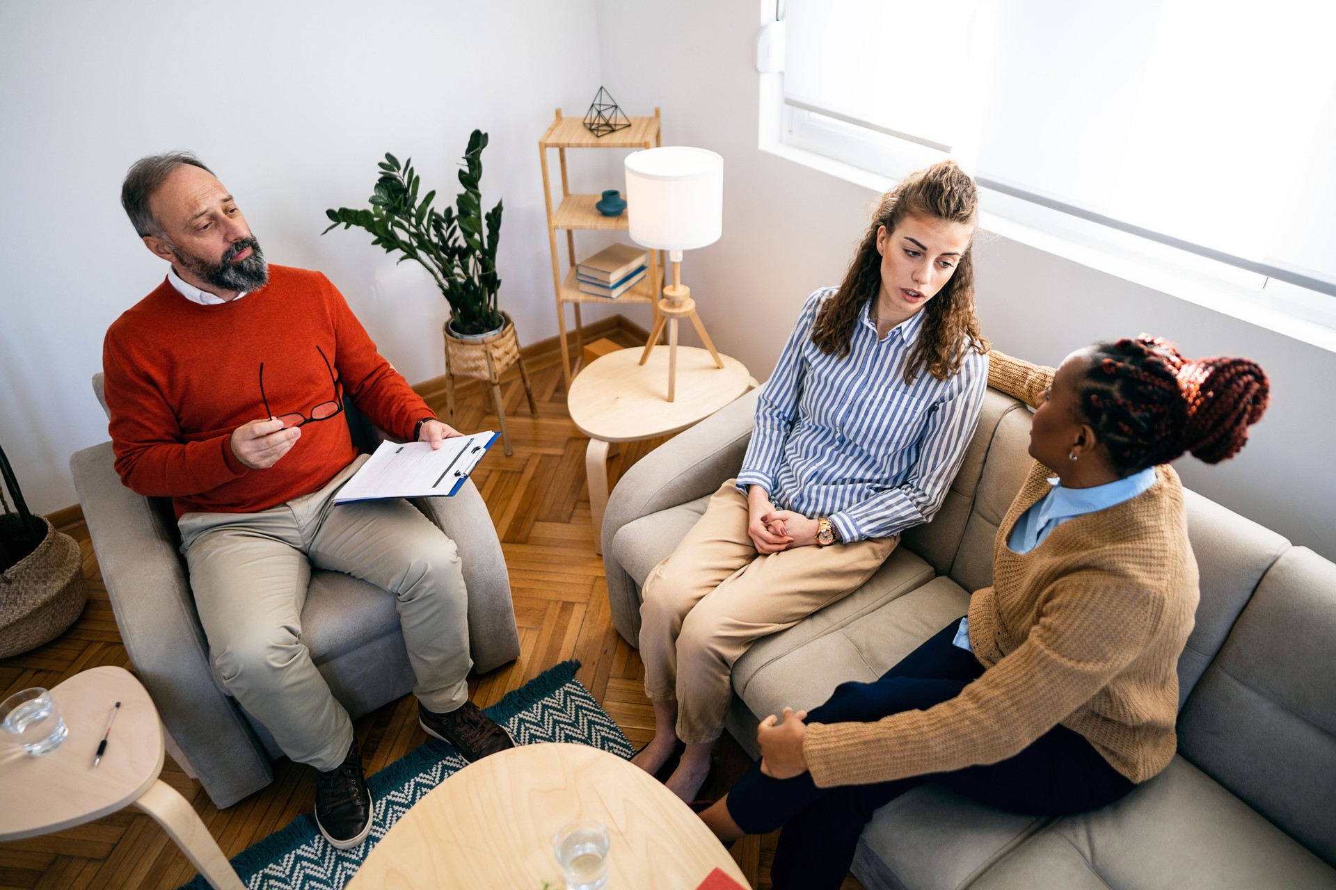 Multiracial homosexual couple at the therapy